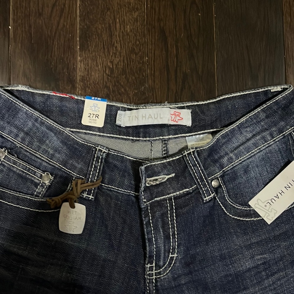 Brand New Tin Haul BootCut blue jeans . Size 27R. Run Small